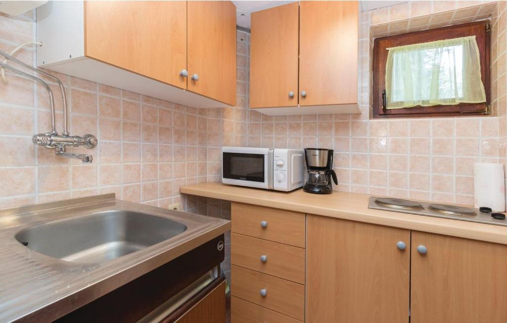 Apartmani Cizmesija Tkon Esterno foto
