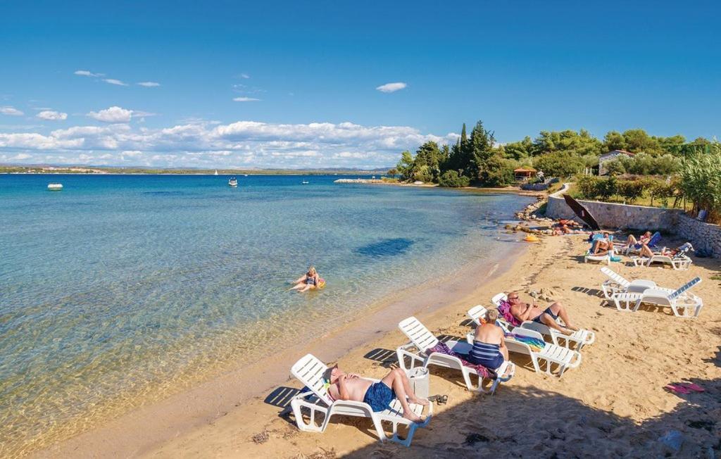 Apartmani Cizmesija Tkon Esterno foto