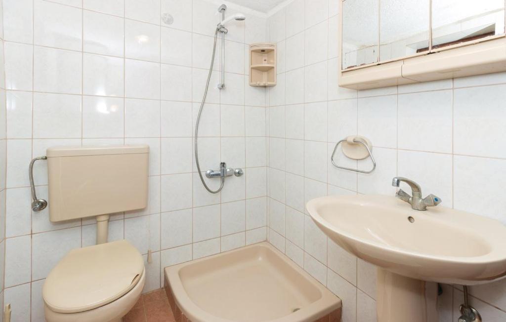 Apartmani Cizmesija Tkon Esterno foto