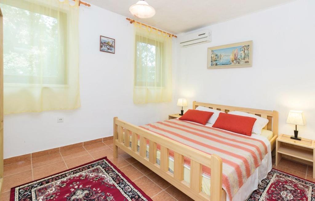 Apartmani Cizmesija Tkon Esterno foto