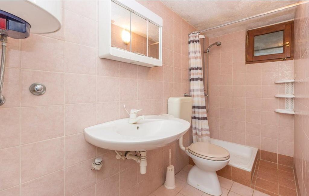 Apartmani Cizmesija Tkon Esterno foto