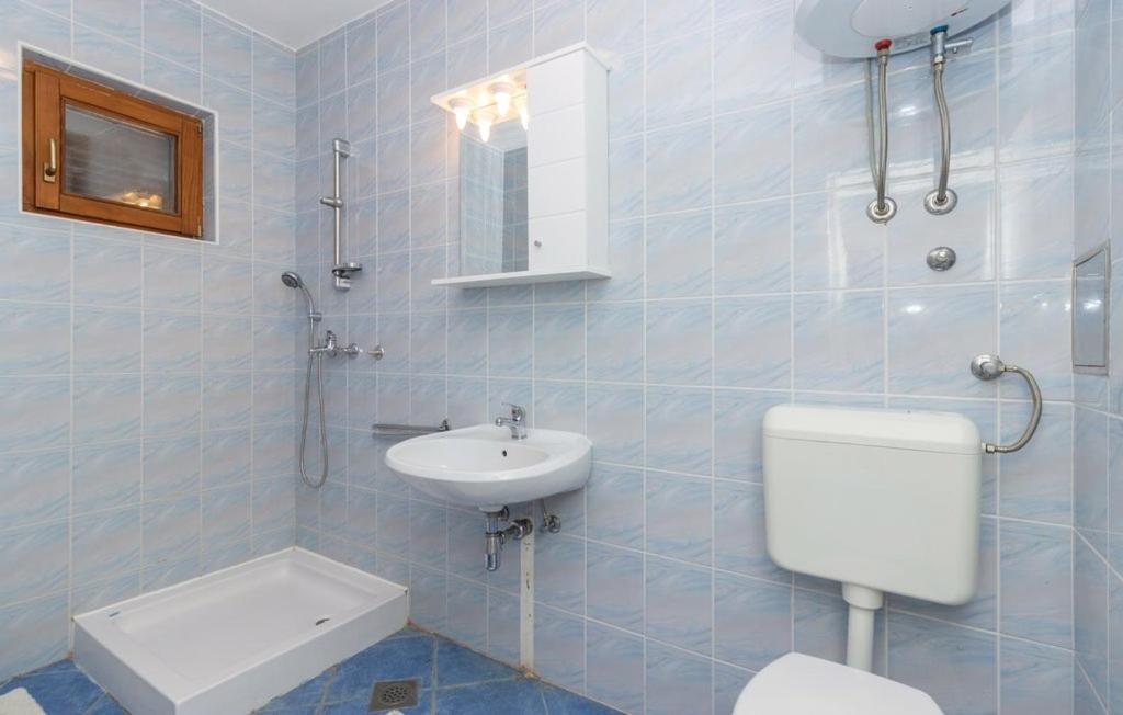 Apartmani Cizmesija Tkon Esterno foto